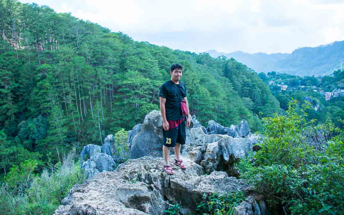 Echo Valley viewpoint showing traditional Igorot hanging coffins on limestone cliffs in Sagada Mountain Province