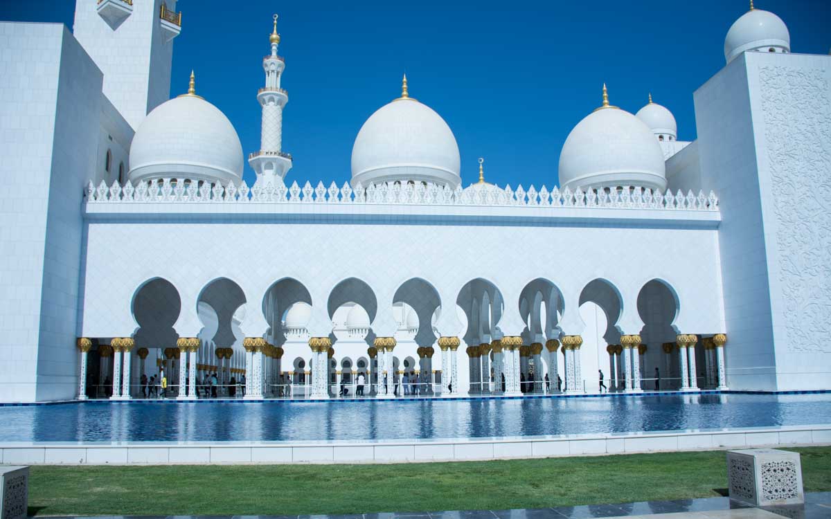 Reflection pools at Sheikh Zayed Mosque creating symmetrical views for photography