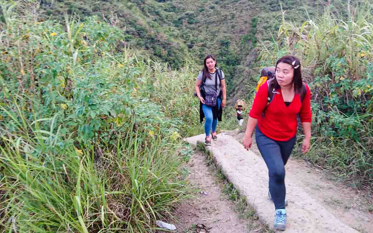 Alex and Hanah trekking in Buscalan