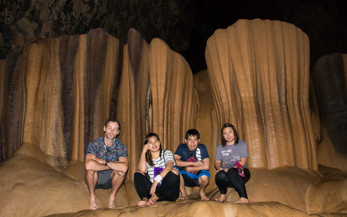 Jasper, Alex, Nathaniel, and Hanah at "King's curtain" in Sumaguing Cave
