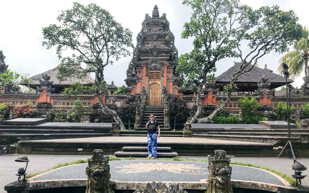 A woman in a black shirt at Saraswati Temple