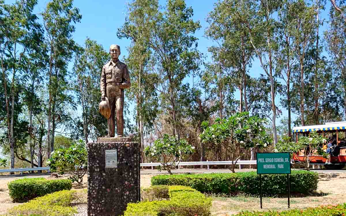 a statue of a man at the Pres. Sergio Osmeña, Sr Memorial Park in Corregidor Island